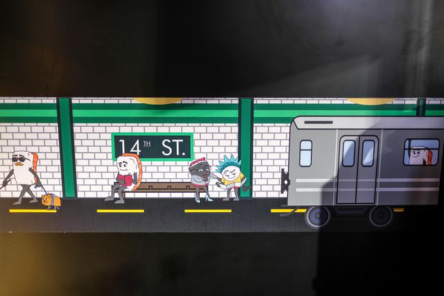 cartoon subway art on the wall